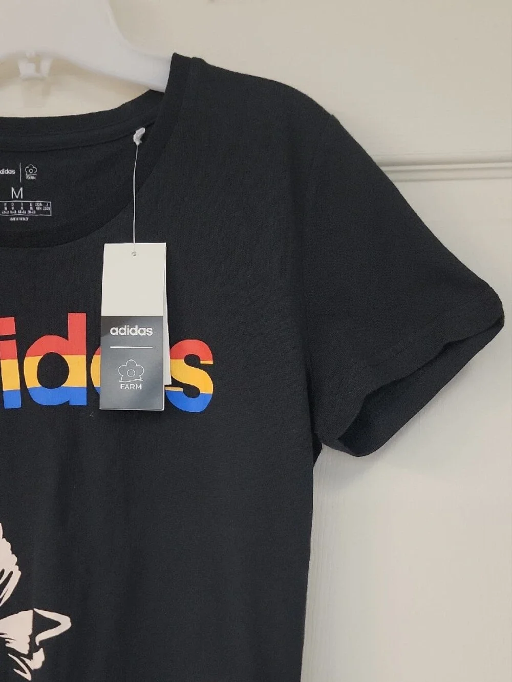 adidas Black Tee with Rainbow Logo and Yellow Butterfly Accents